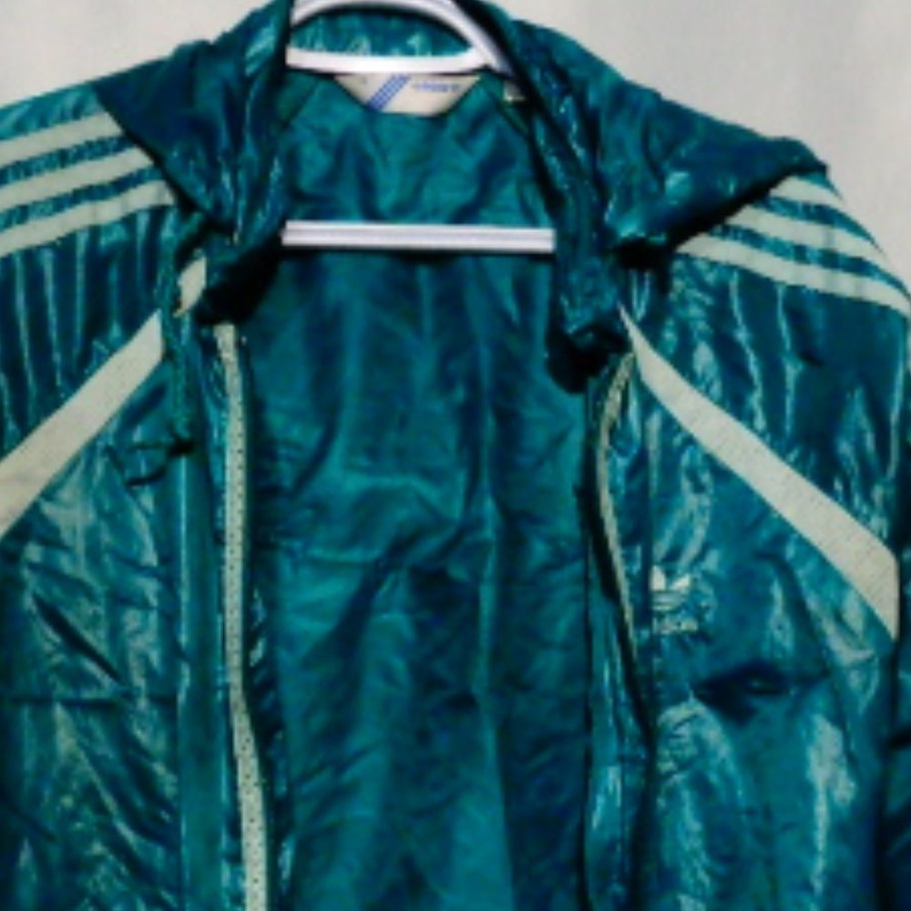Rain coat  ADIDAS size LG